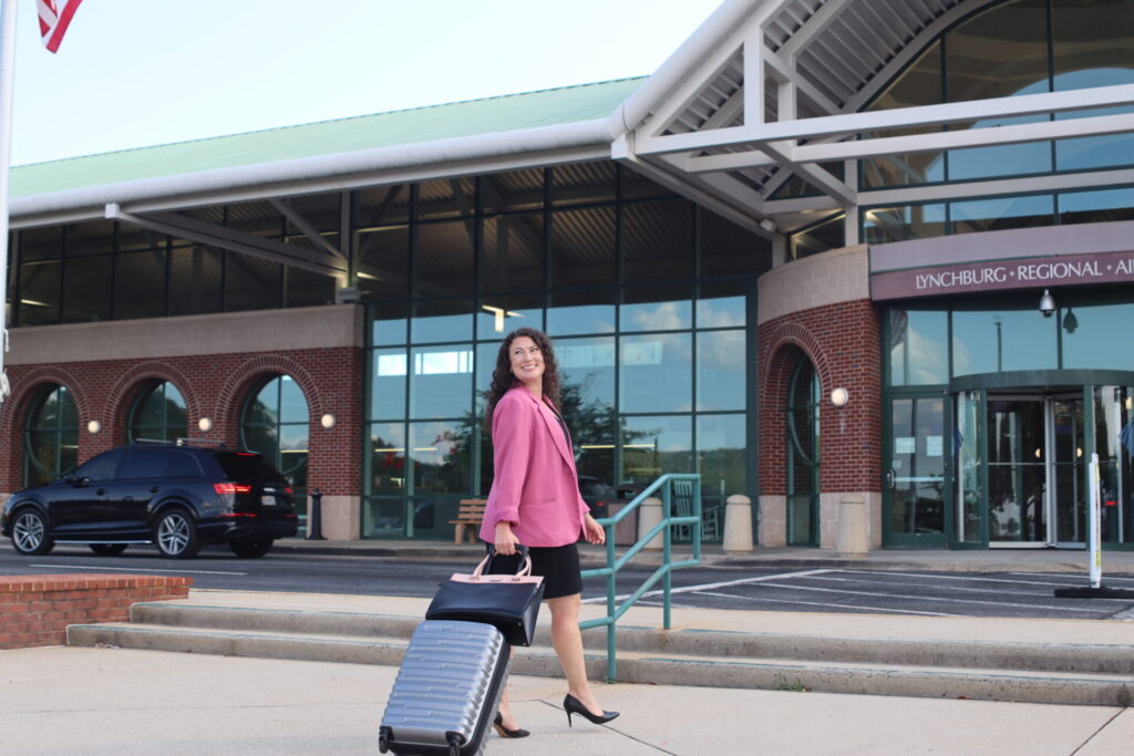 Woman in front of Lynchburg Regional Airport